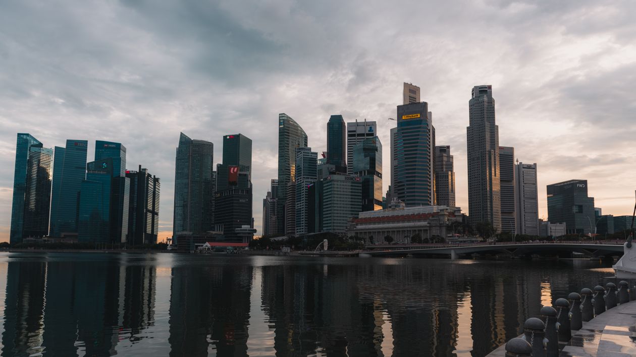 The Singapore skyline reflected in Marina Bay