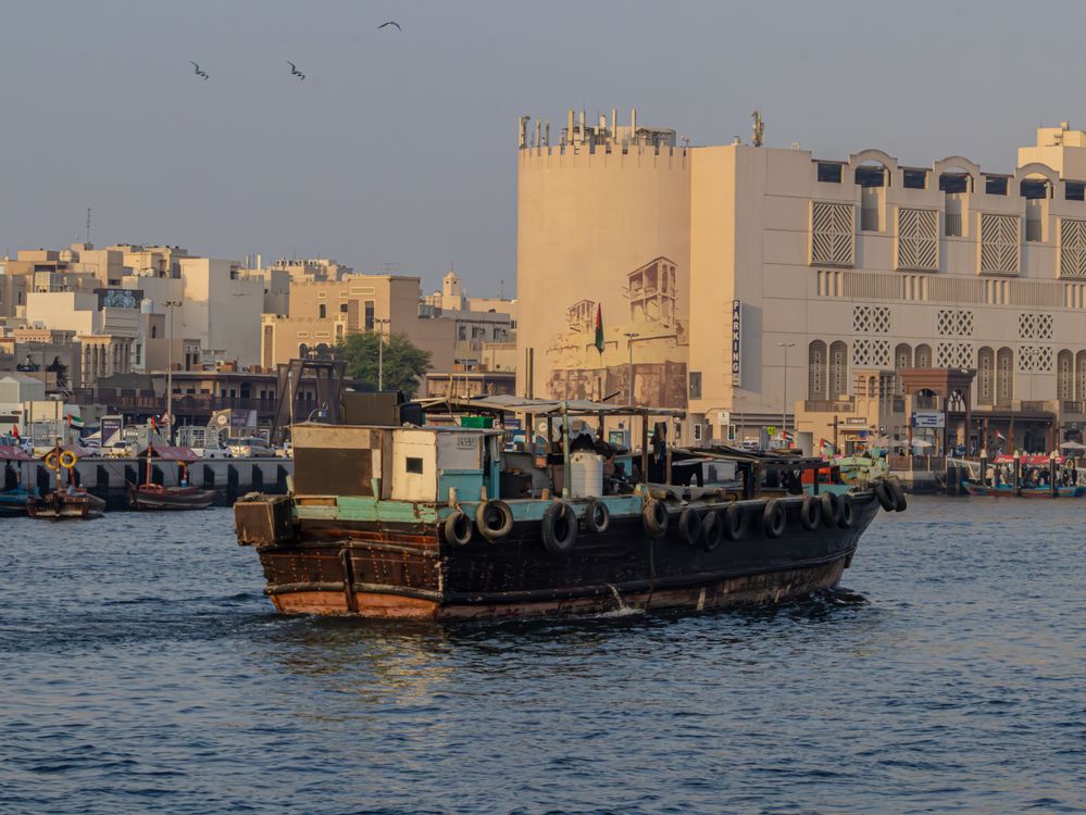 Traditional abra boat on Dubai Creek, old Dubai