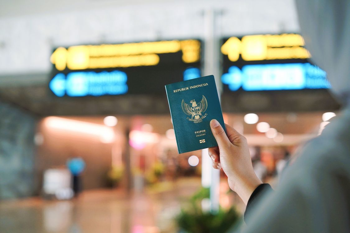 A passport at an airport departure gate